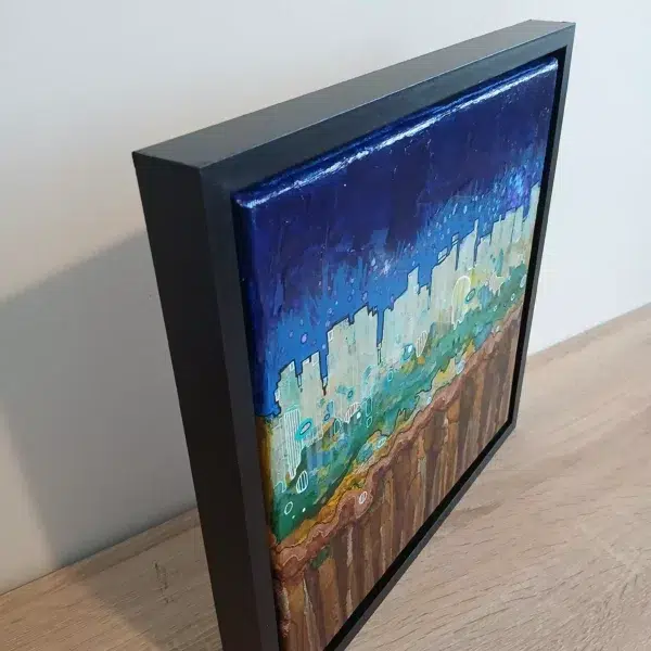 petit tableau urbain ciel atomique 30 cm x 30cm encadré