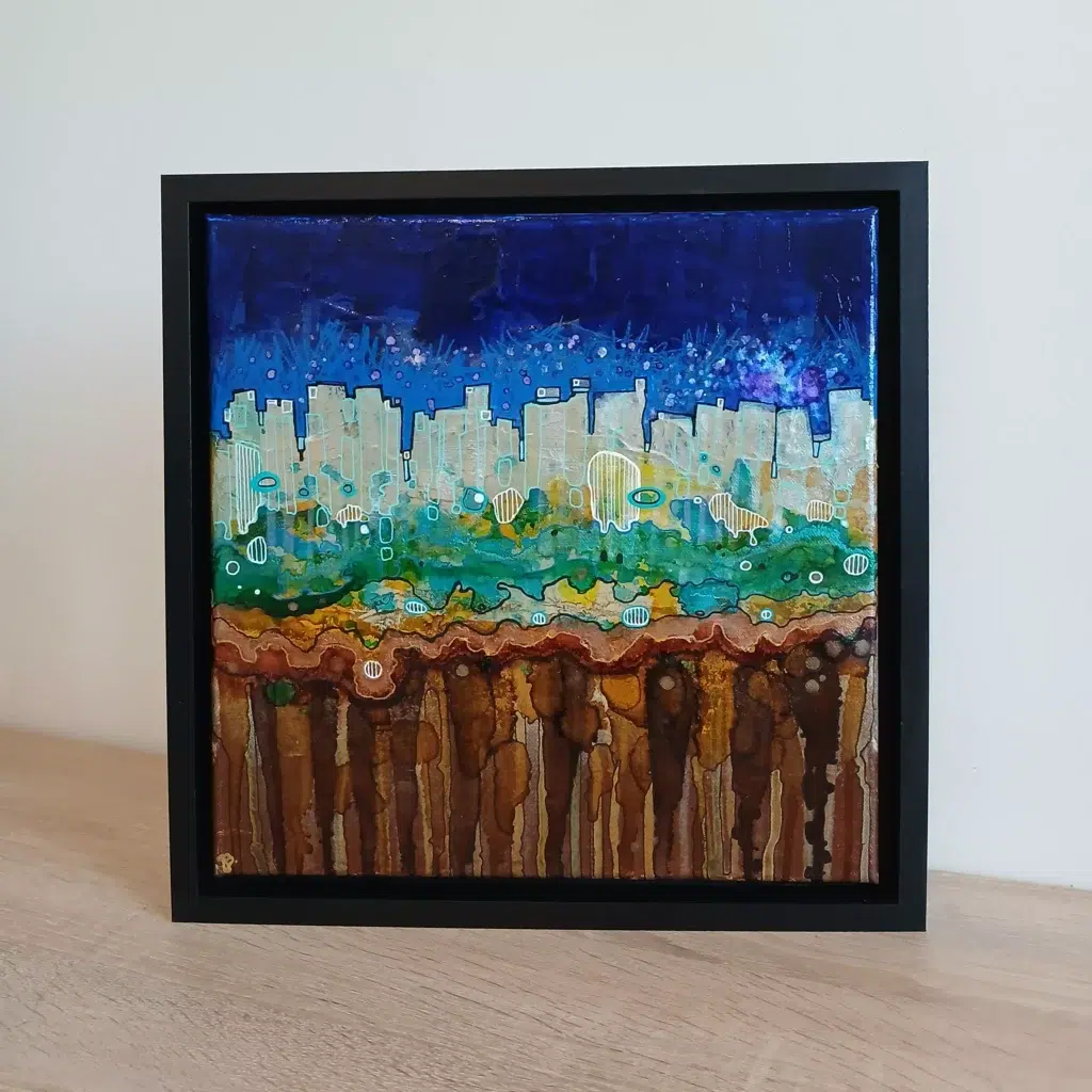 petit tableau urbain ciel atomique 30 cm x 30cm encadré