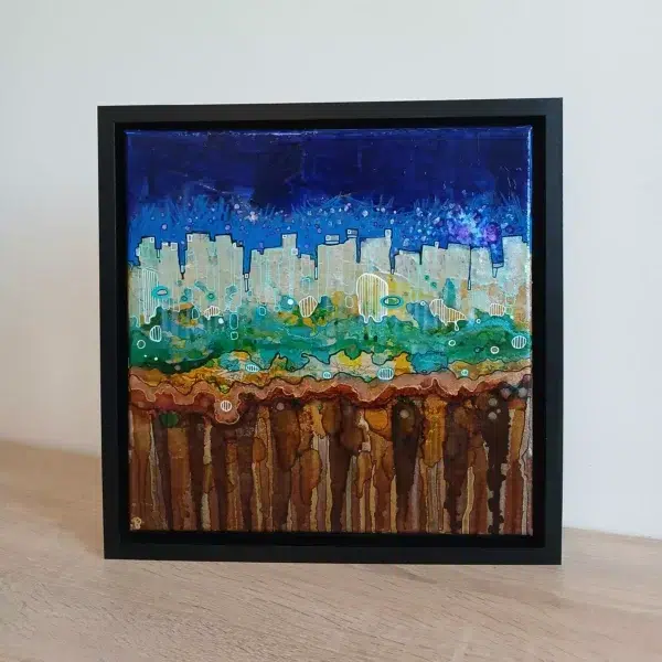 petit tableau urbain ciel atomique 30 cm x 30cm encadré