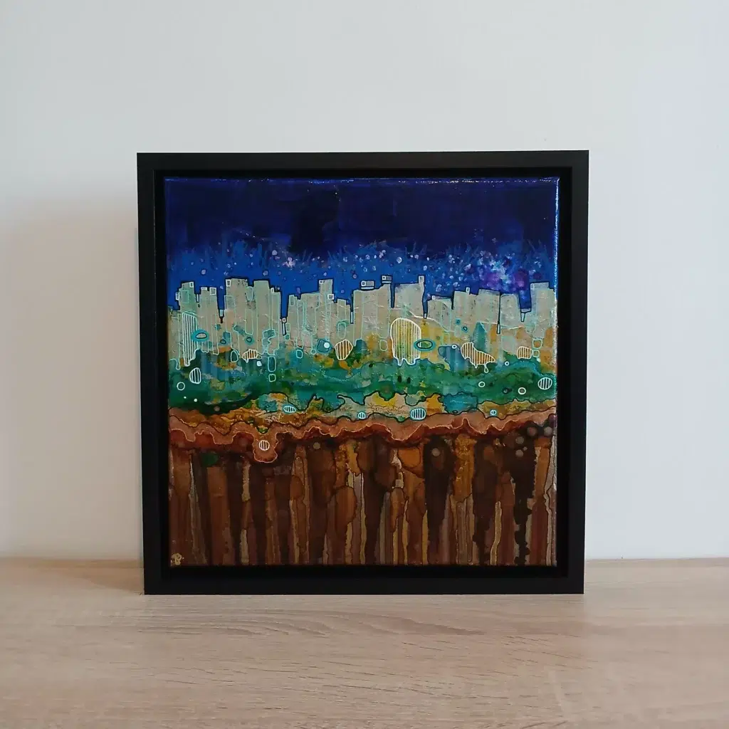 petit tableau urbain ciel atomique 30 cm x 30cm encadré