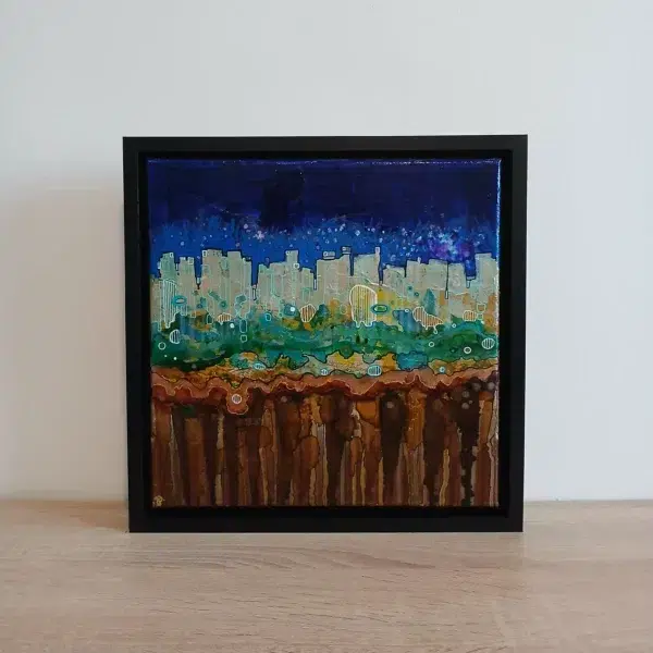 petit tableau urbain ciel atomique 30 cm x 30cm encadré